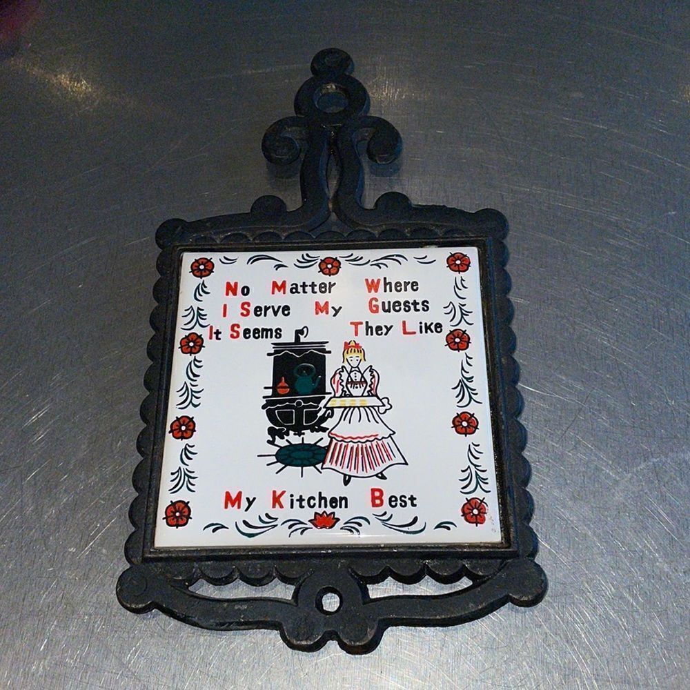 Vtg mid Century cast‎ iron trivet/wall hanging with kitschy ceramic kitchen tile
